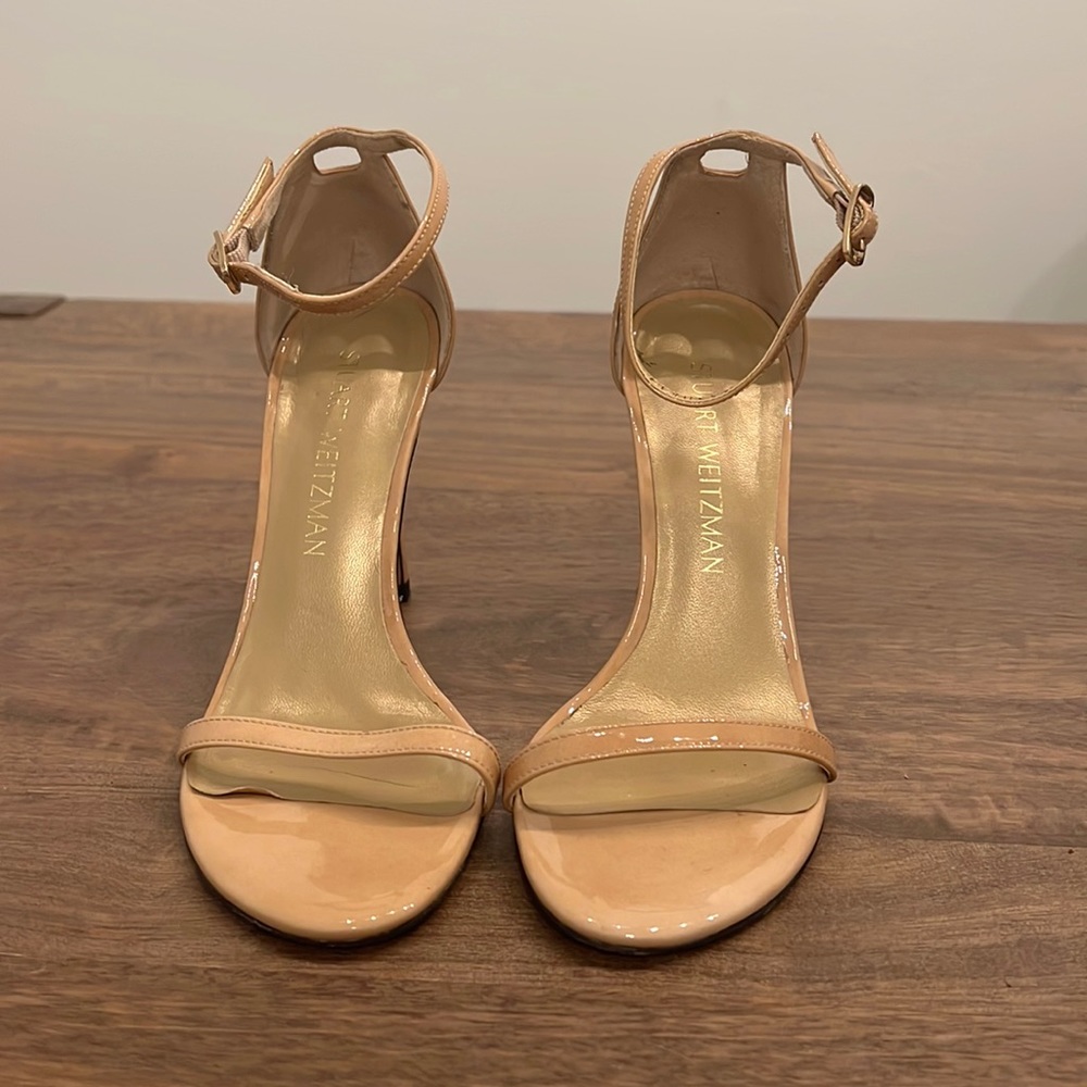 Stuart Weitzman Nudist Heel in Nude patent leather with a 4 inch heel